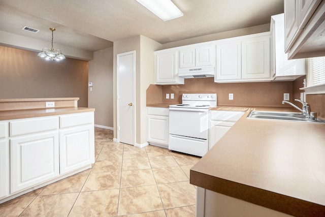 kitchen with visible vents, under cabinet range hood, light tile patterned floors, electric stove, and a sink