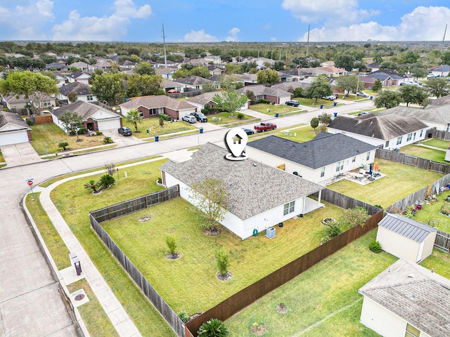 drone / aerial view with a residential view