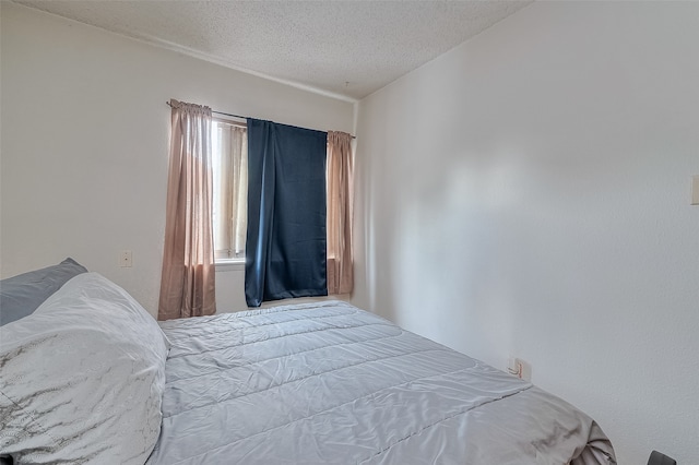 bedroom with a textured ceiling