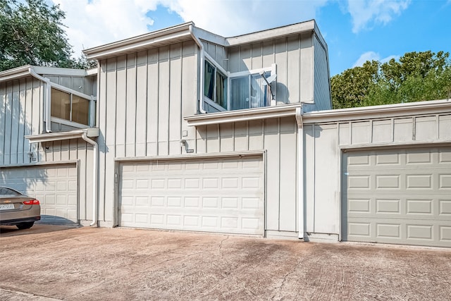 exterior space with a garage