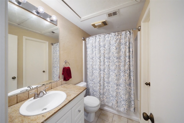 full bathroom with tile patterned floors, vanity, toilet, and shower / tub combo with curtain