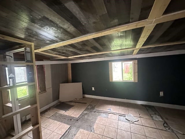 empty room featuring vaulted ceiling