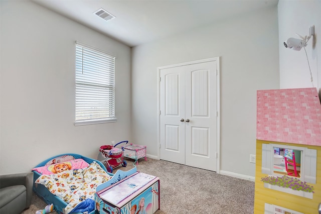 game room with light carpet