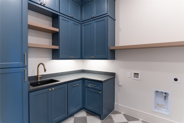 laundry room with cabinets, washer hookup, hookup for a gas dryer, hookup for an electric dryer, and sink