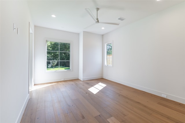 empty room featuring light hardwood / wood-style floors and ceiling fan