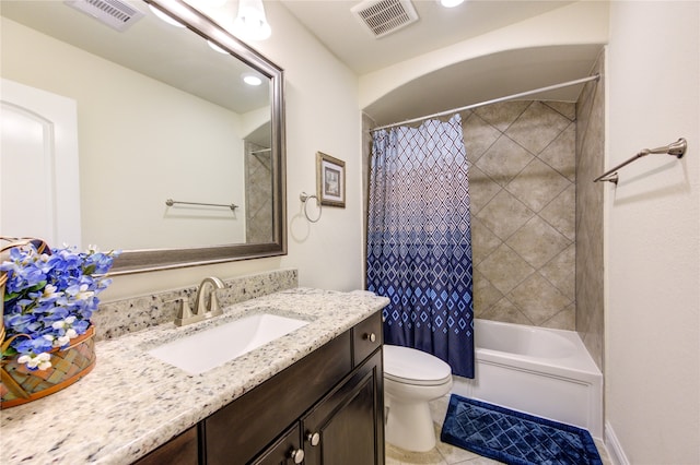 full bathroom with tile patterned floors, vanity, toilet, and shower / tub combo