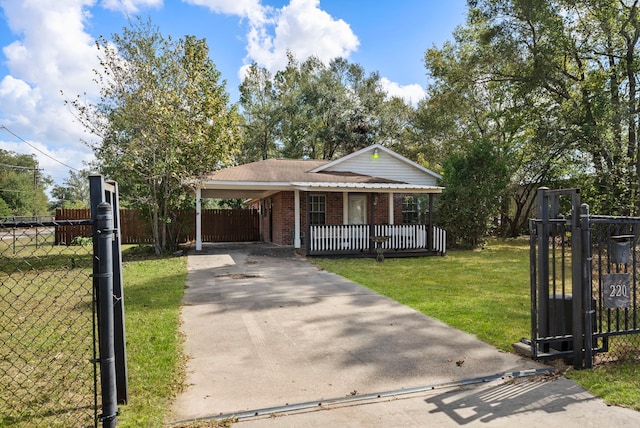 ranch-style home with a front lawn and a carport