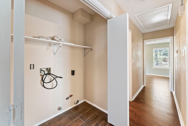 clothes washing area featuring hookup for a washing machine, gas dryer hookup, and dark hardwood / wood-style flooring