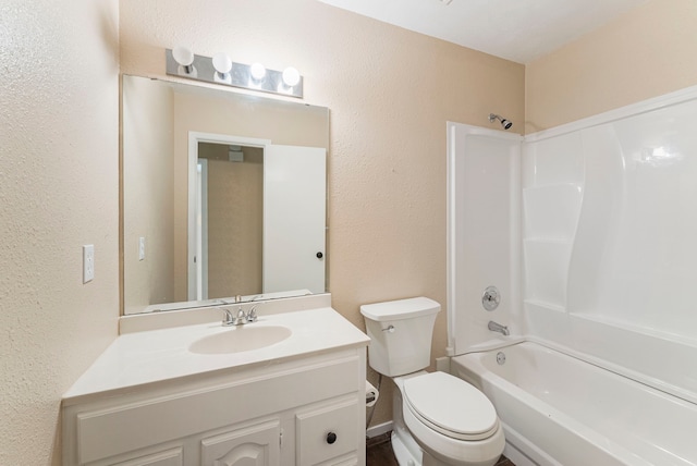 full bathroom with vanity, toilet, and washtub / shower combination