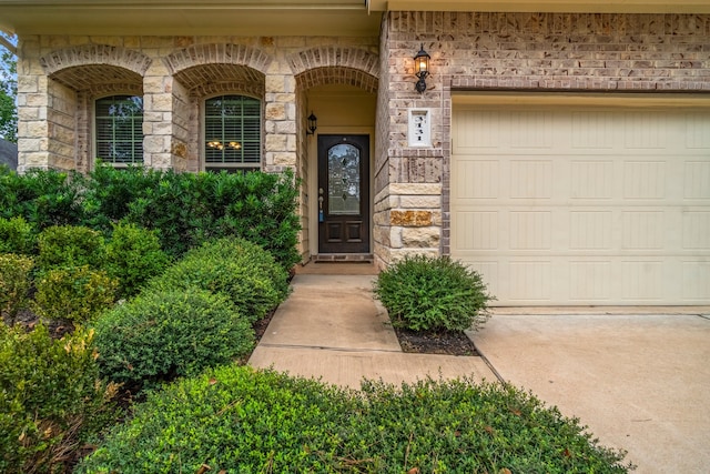 property entrance with a garage