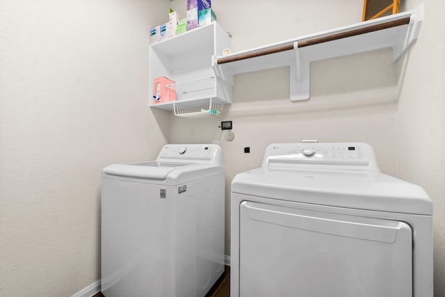 laundry room with independent washer and dryer