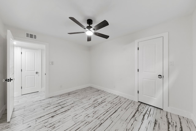 spare room featuring ceiling fan