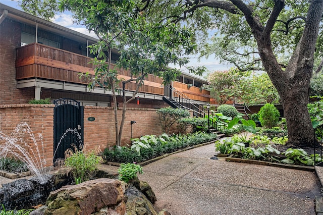 exterior space featuring a balcony