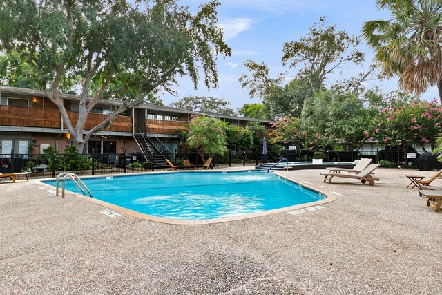 view of pool with a patio