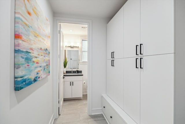 mudroom featuring sink