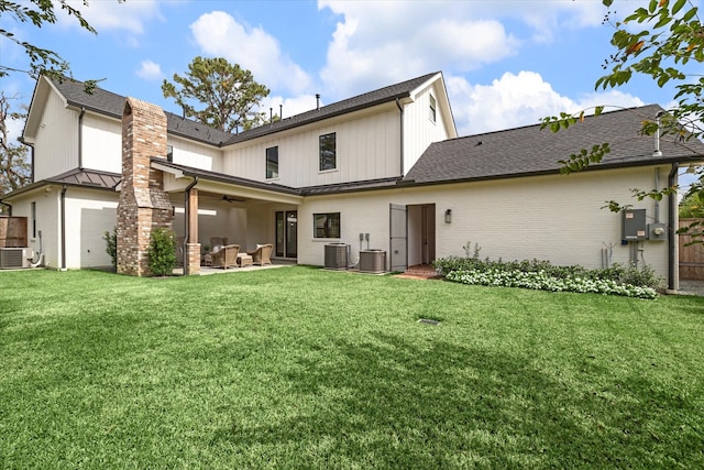 back of house featuring a yard, a patio area, central AC, and ceiling fan