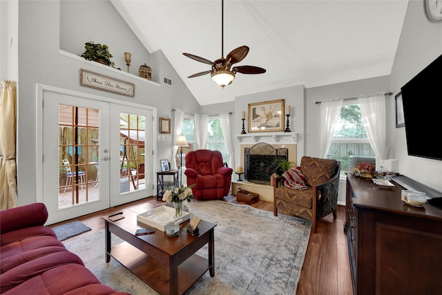 living room with high vaulted ceiling, french doors, ceiling fan, and wood-type flooring