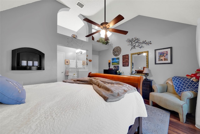 bedroom featuring high vaulted ceiling, hardwood / wood-style floors, and ceiling fan