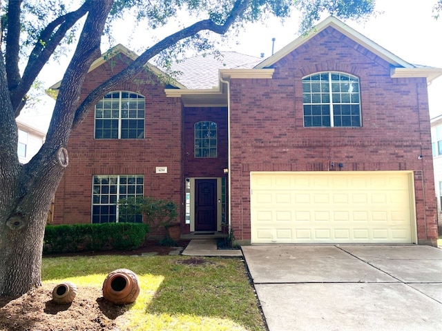 view of front of property featuring a garage