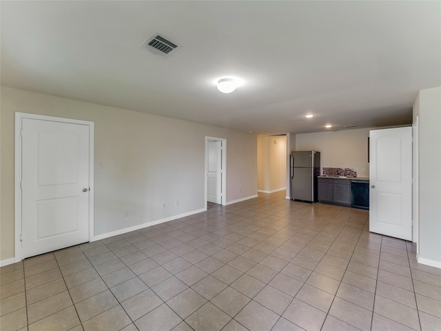 interior space with light tile patterned floors