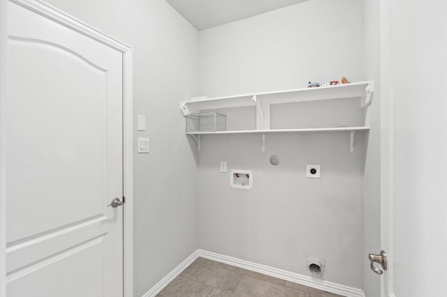 washroom with light tile patterned floors, electric dryer hookup, washer hookup, and gas dryer hookup