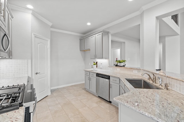 kitchen with sink, ornamental molding, stainless steel appliances, light stone counters, and decorative backsplash