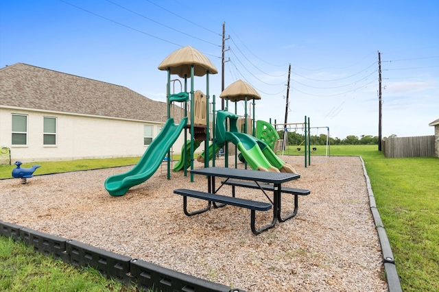 view of jungle gym featuring a yard