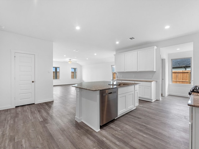 kitchen with white cabinetry, stainless steel appliances, sink, and plenty of natural light