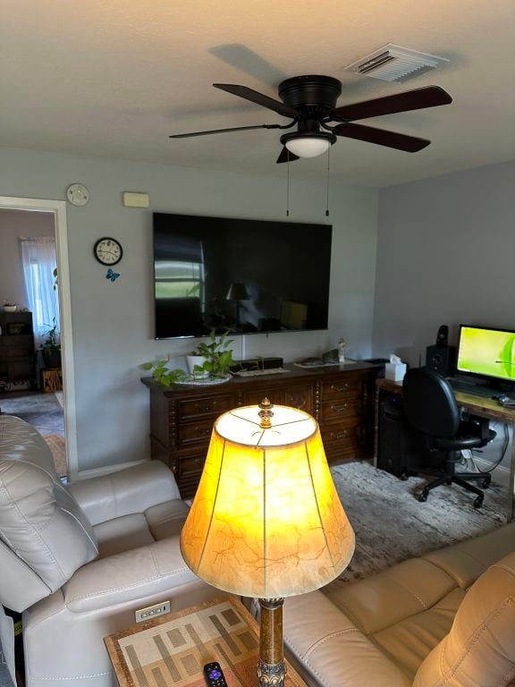 living room with ceiling fan