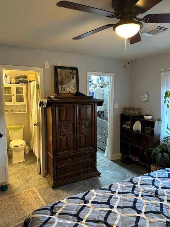 bedroom featuring connected bathroom and ceiling fan