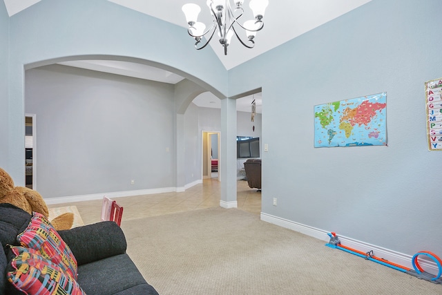 living area featuring light carpet, lofted ceiling, and a chandelier