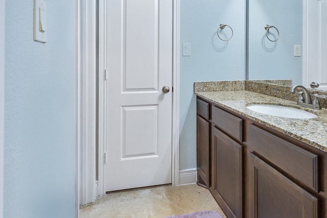 bathroom featuring vanity and tile patterned floors