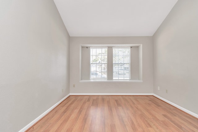 unfurnished room featuring light hardwood / wood-style flooring