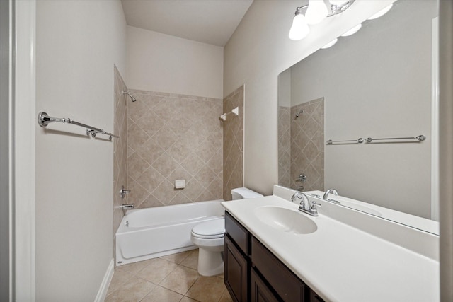 full bathroom with tile patterned floors, vanity, toilet, and tiled shower / bath