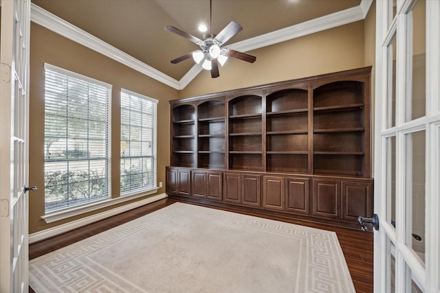 home office featuring dark hardwood / wood-style floors, a healthy amount of sunlight, crown molding, and french doors