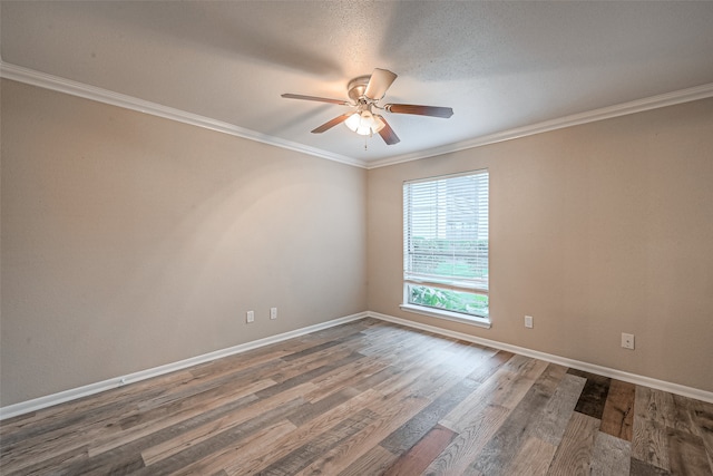 spare room with hardwood / wood-style flooring, ceiling fan, a textured ceiling, and crown molding