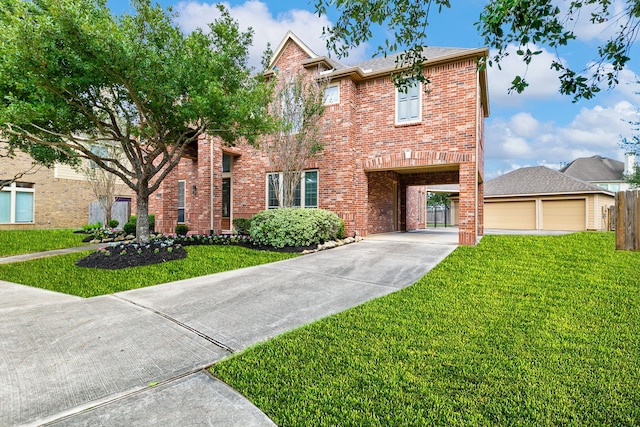 view of front of property with a front yard and a carport