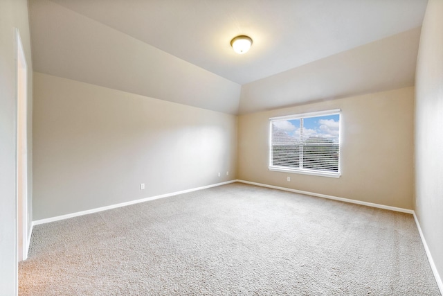 interior space featuring vaulted ceiling