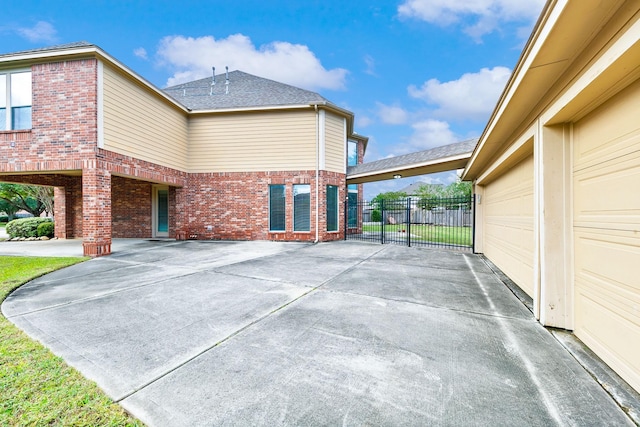 view of property exterior featuring a garage