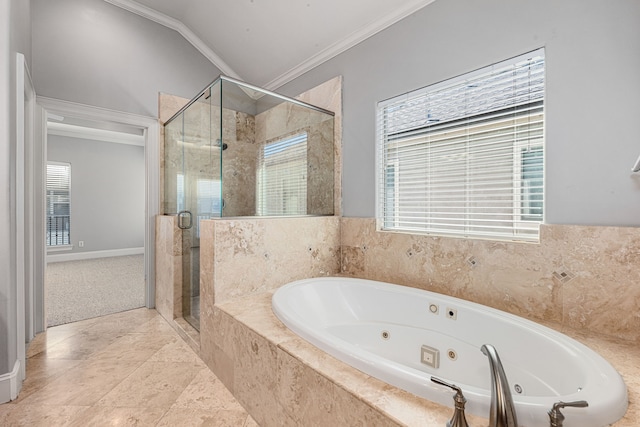 bathroom with separate shower and tub and ornamental molding