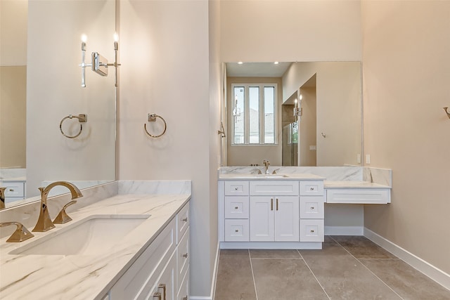 bathroom with vanity and tile patterned flooring