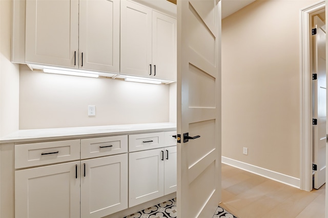 kitchen with white cabinetry