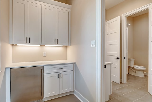 interior space featuring light tile patterned floors