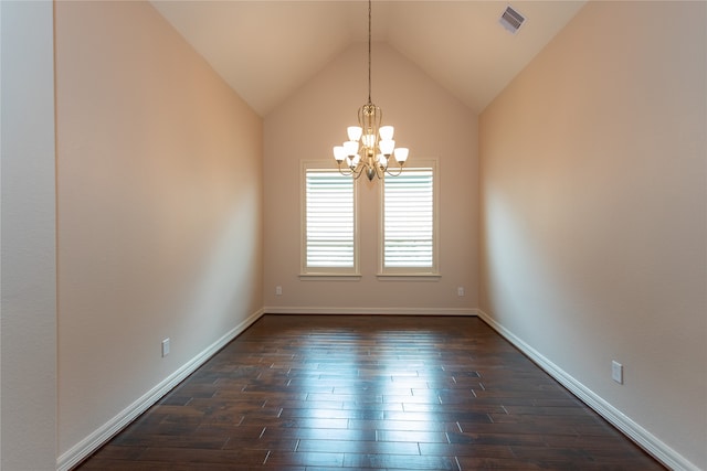 unfurnished room featuring an inviting chandelier, dark hardwood / wood-style floors, and vaulted ceiling