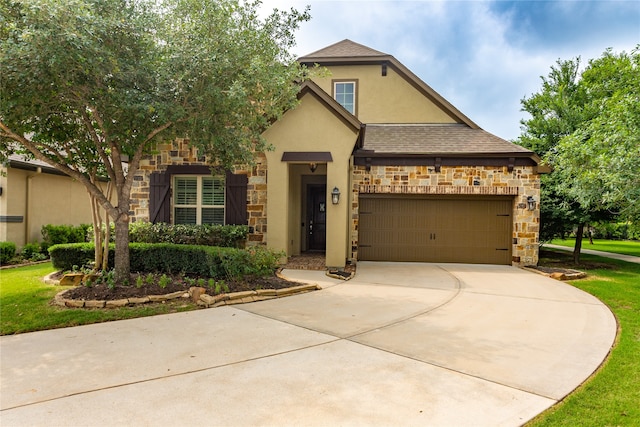 view of front of property featuring a garage