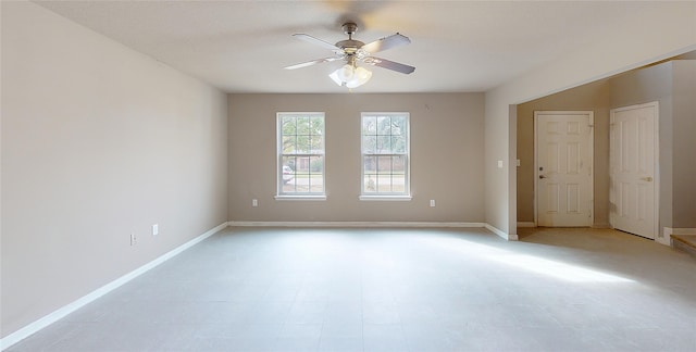 unfurnished room featuring ceiling fan