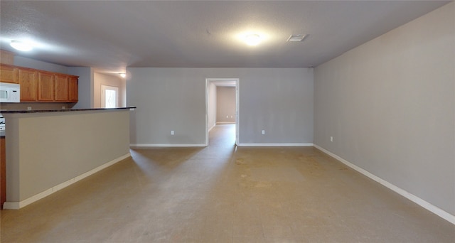 interior space featuring a textured ceiling