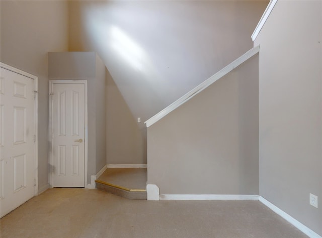 interior space featuring vaulted ceiling