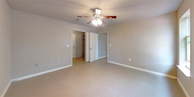 spare room with ceiling fan