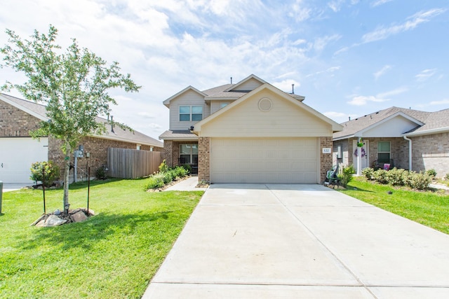 122 Austin Rd, Angleton, TX 77515 - traditional-style house featuring fence, brick siding, concrete driveway, a garage, and a front yard